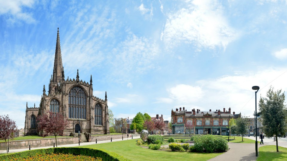 Minster Gardens with the Heart of Steel and Rotherham Minster in the background