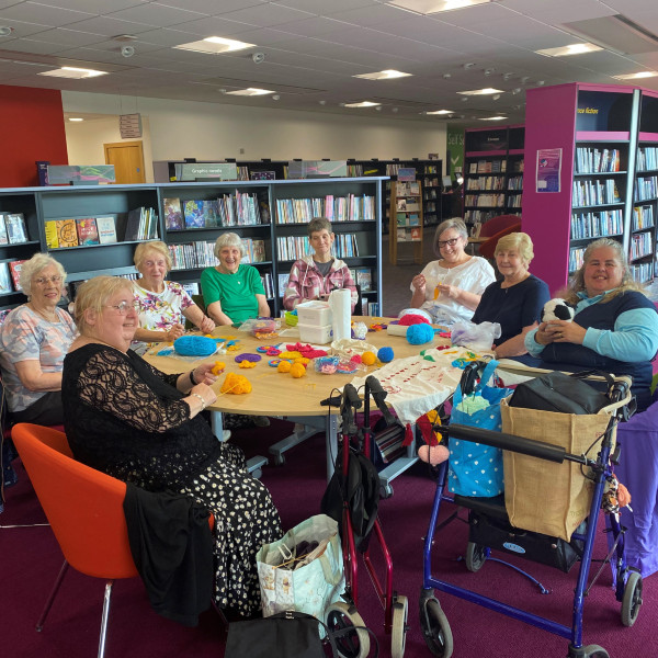 Group of people knitting in Riverside library